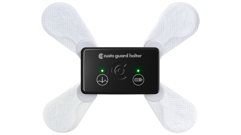 custo guard holter mit den Klebeelektroden custo wing auf transparentem Hintergrund. Das Bild zeigt die richtige Anlage der Elektroden.